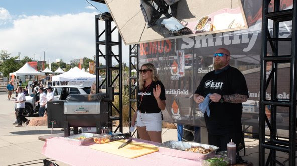 Carla hosting a grilling demo on the Smithfield stage at the Denver BBQ Festival