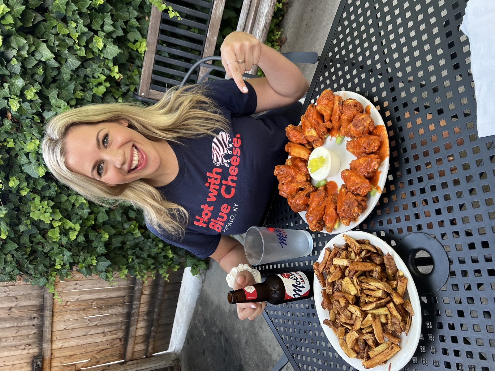 Carla in a Hot with Blue Cheese T-shirt with wings
